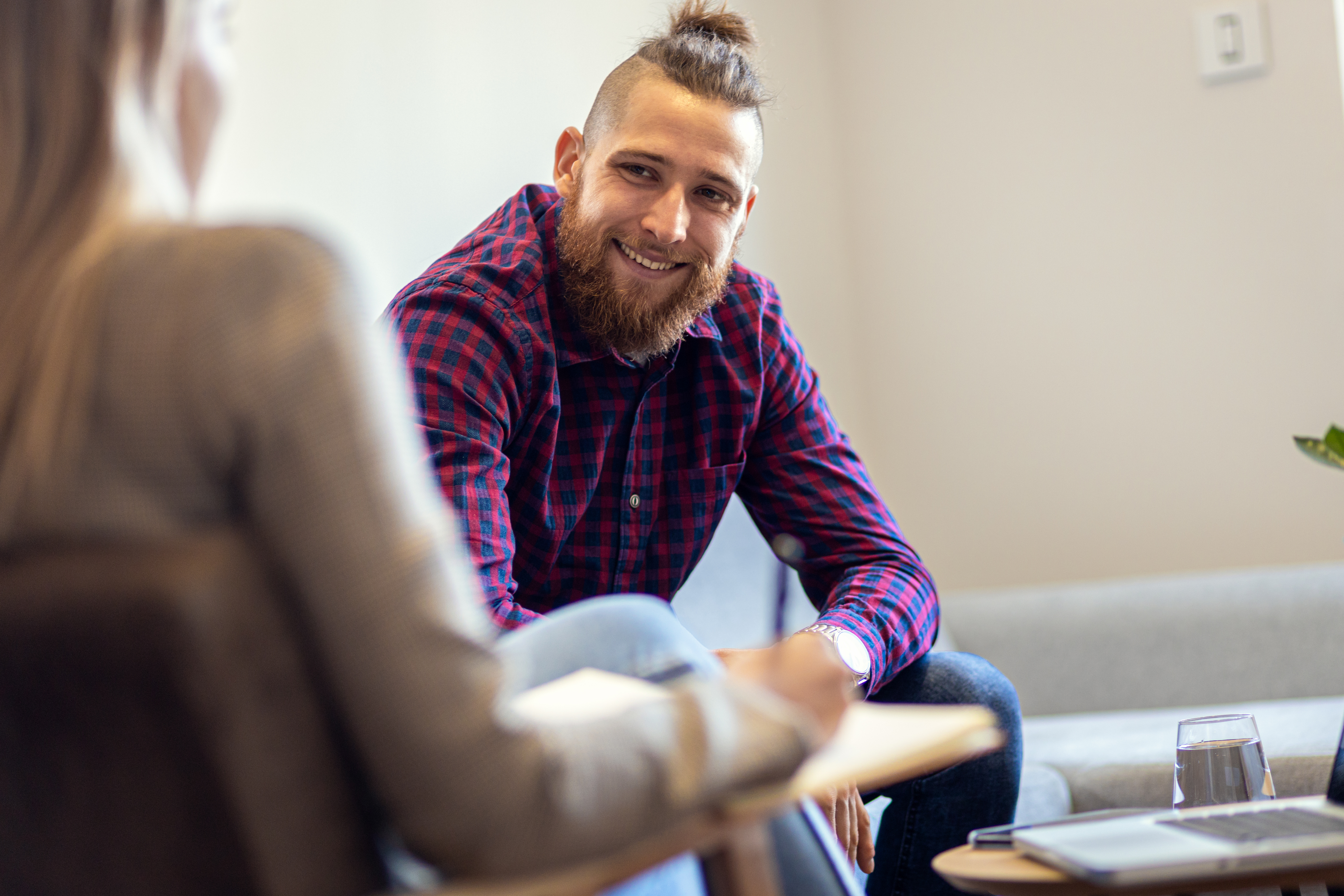 A man finding support from a group therapy for suboxone treatment.