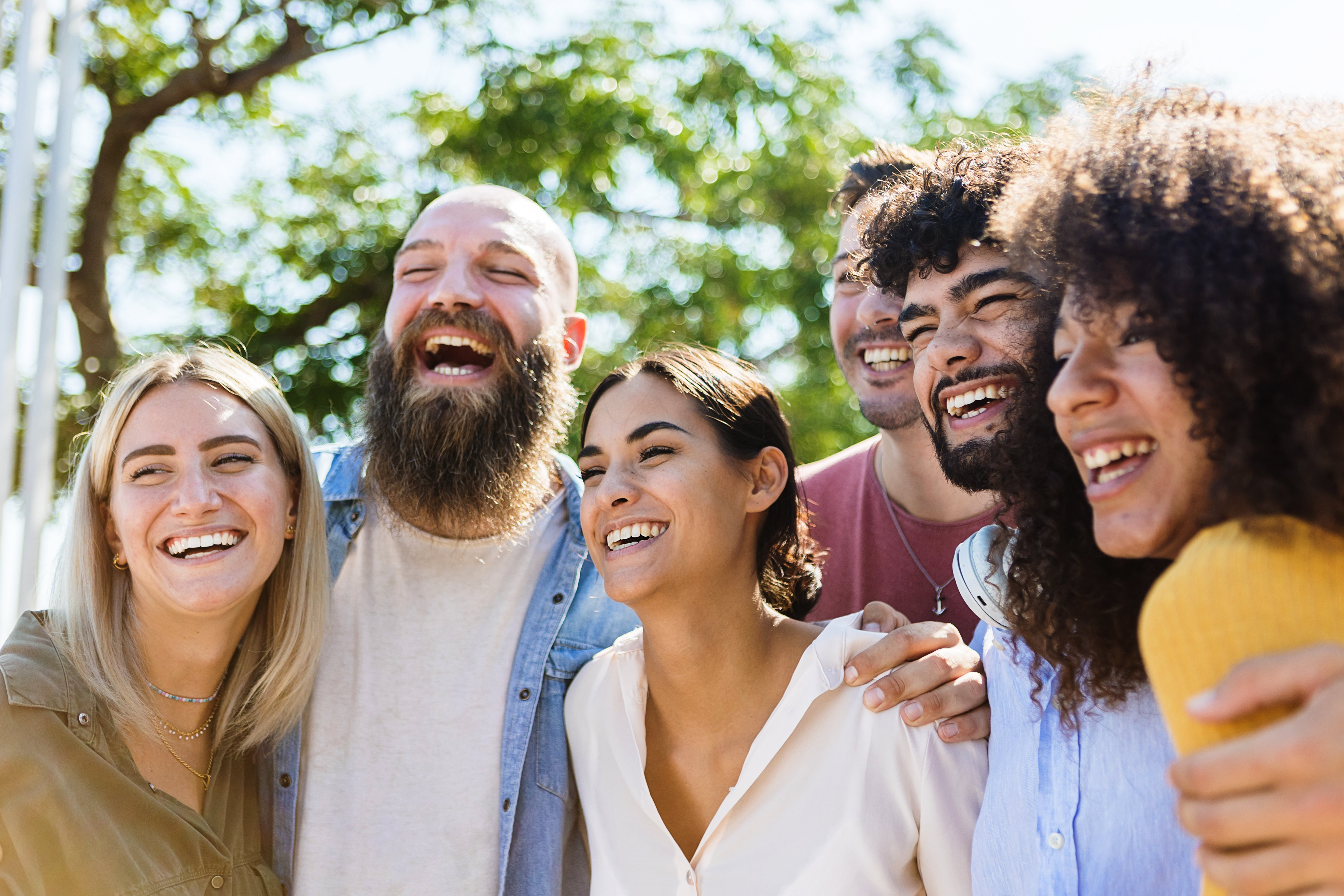 Fentanyl Addiction Treatment in Tennessee and Virginia; Multiracial best friends enjoying time together outdoors