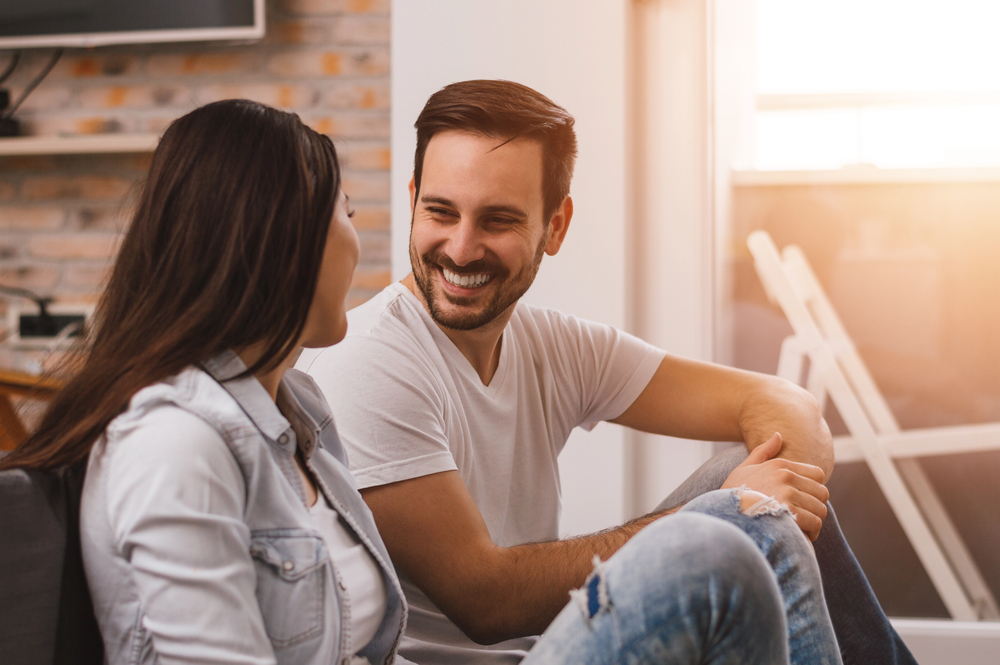 Happy couple having a conversations - addiction intervention