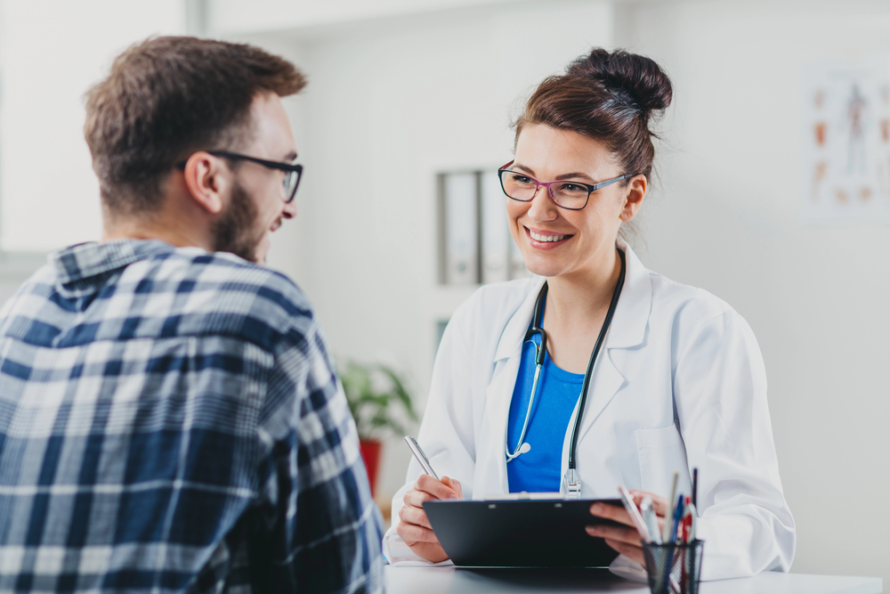 How long does fentanyl stay in your system featured image - A patient consulting a healthcare provider about addiction.