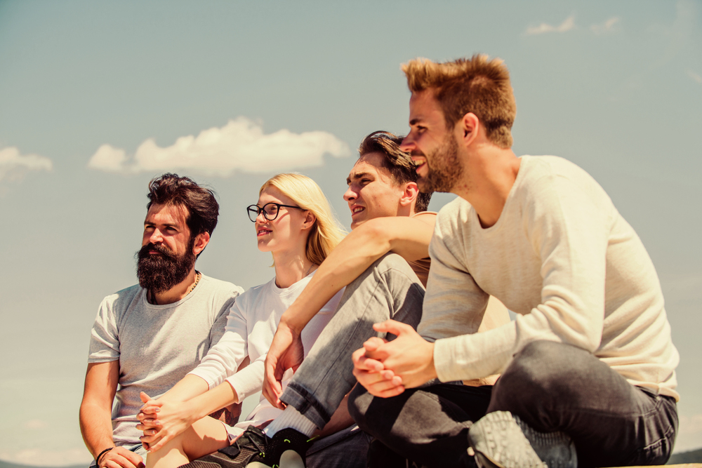 Finding strength in each other, members of a suboxone treatment group connect during an outdoor activity.