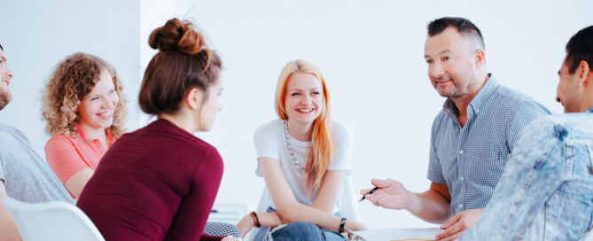 A group therapy session for prescription opioid addiction treatment.