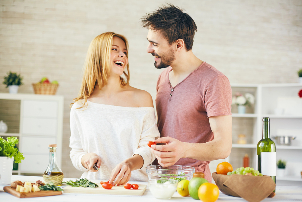 A couple radiating positivity while practicing healthy habits for emotional balance and self-esteem.
