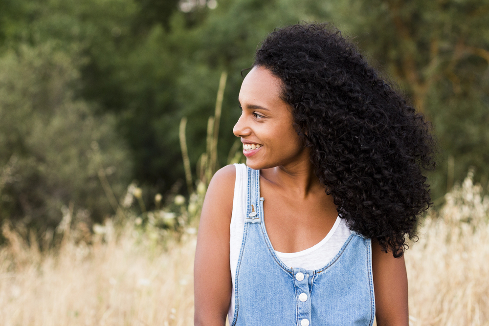Woman smiling in a outdoor setting